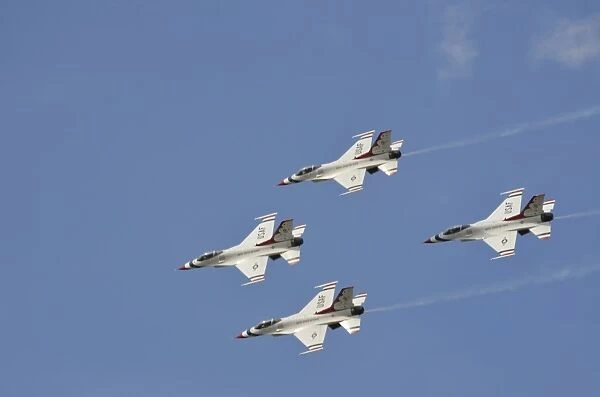 The U. S. Air Force Thunderbirds fly in formation