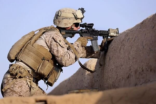 U. S. Marine provides security during a patrol in Afghanistan