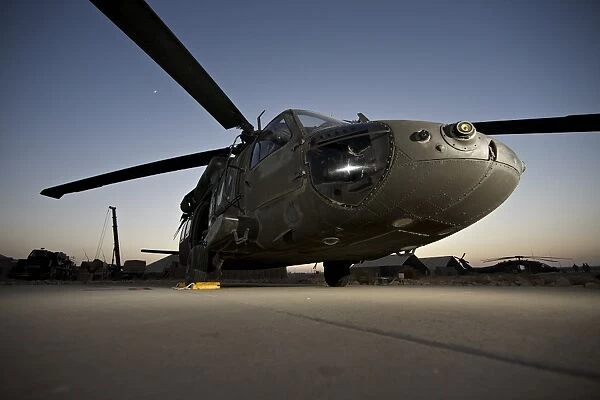 A UH-60L Blackhawk parked on its pad