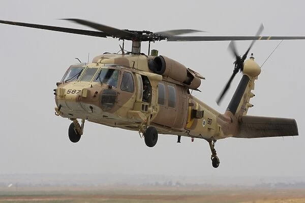 A UH-60L Yanshuf helicopter landing at Hatzerim Air Force Base, Israel