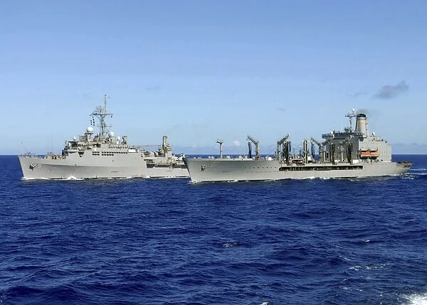 USS Denver and USNS Pecos conduct a replenishment at sea