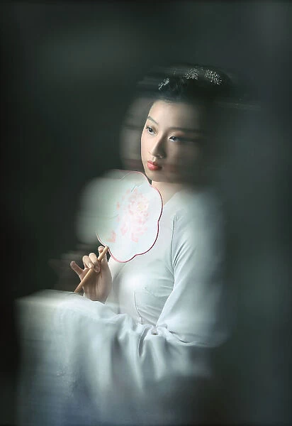 Ancient Chinese Girl with a Round Silk Fan