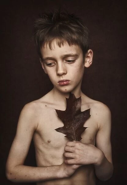 boy with a leaf