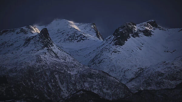 Light on mountain's top in Lofotena