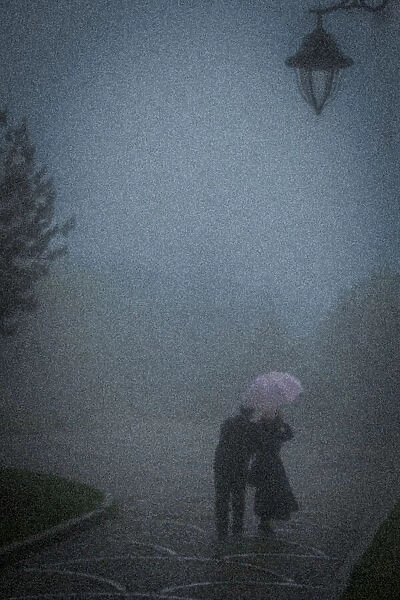 Under a pink umbrella