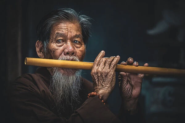 Playing Flute in northern Vietnam