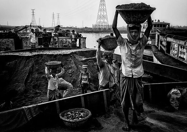 Unloading a boat - Bangladesh