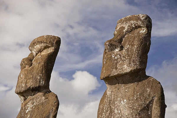 Close up of two stone sculptures  /  Moai at Ahu Ahivi  /  Ahu Akivi, Easter Island, South