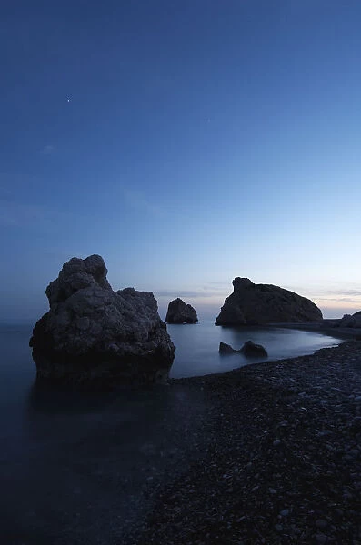 Petra tou Romiou (Aphrodites Rock) at dusk, Pissouri Bay, near Paphos, Cyprus