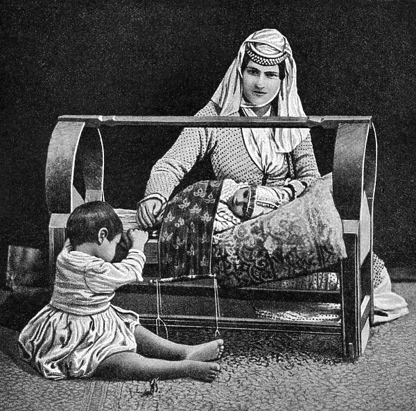 An Armenian mother and her children, 1922. Artist: W Llewellyn Williams