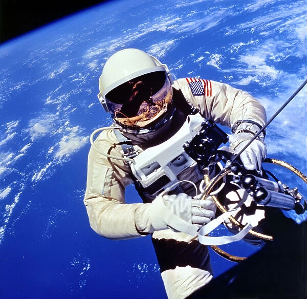US Astronaut Edward H. White II carrying out external tasks
