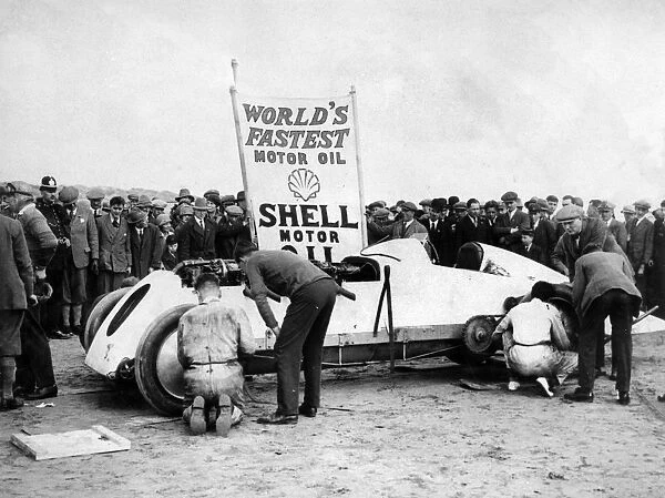 BABS with Parry Thomas, having wheel changed at Pendine sands 1926. Creator: Unknown