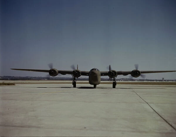 A C-87 transport plane, just off the assembly... Consolidated Aircraft... Fort Worth, Texas, 1942. Creator: Howard Hollem