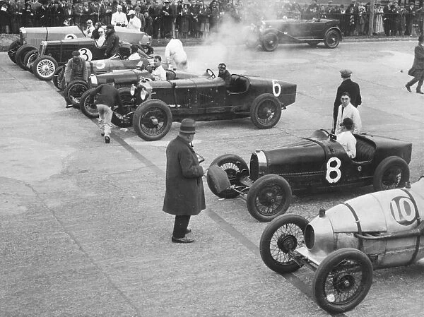 Cars on the start line at a BARC meeting, Brooklands, 1930. Artist: Bill Brunell