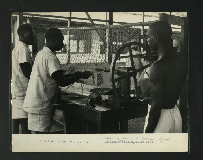 Framed Print : Chain Link Machine Print, Uganda Prison Scene
