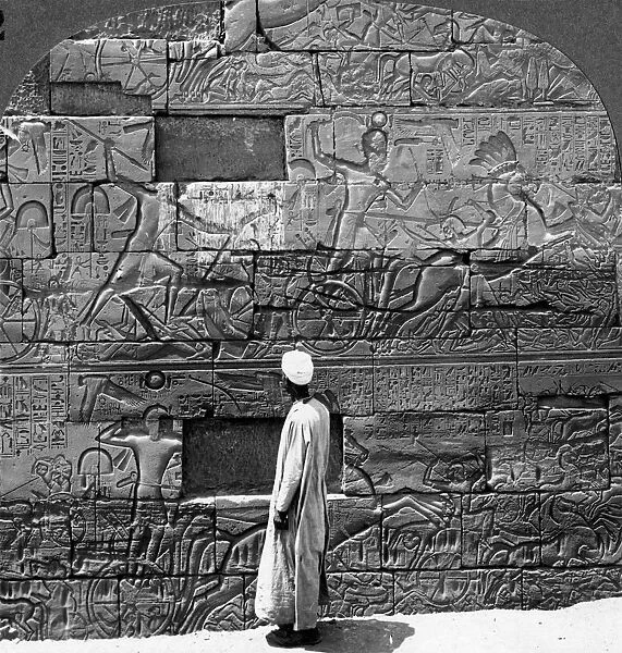 Great war reliefs sculptured in the wall at Karnak Temple, Thebes, Egypt, 1905. Artist: Underwood & Underwood