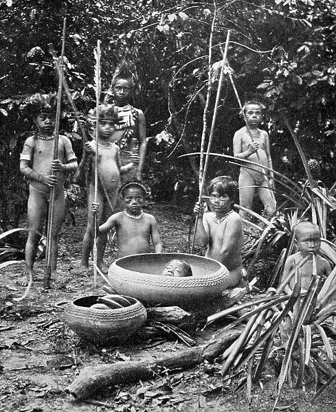 Indians of the Putumayo River with a decapitated head, Amazonia