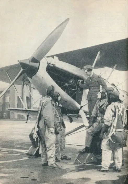 Framed Print : A print of an instructor explaining engine details to pupils at Sealand Aerodrome