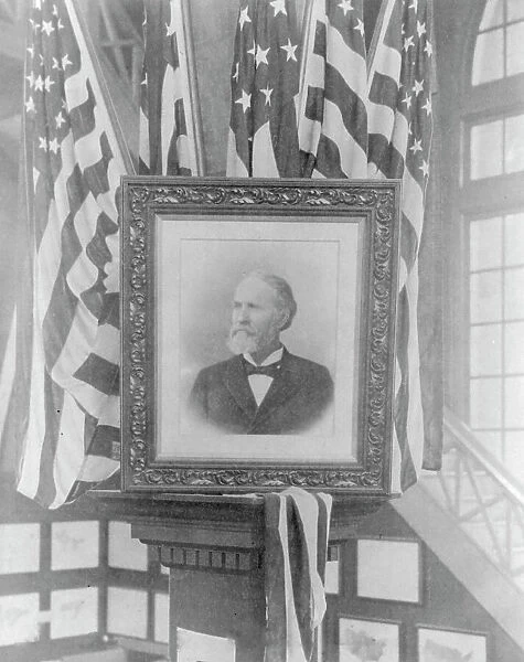 James Wilson, 1857-1932; photo of flag-decked framed bust portr. facing left, n.d.. Creator: Frances Benjamin Johnston