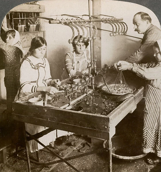 Manufacturing silk, Syria, 1900s. Artist: Underwood & Underwood