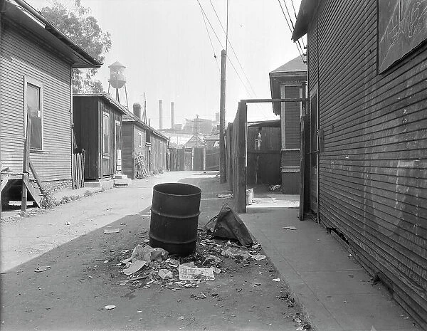 Mexican quarter of Los Angeles, one quarter mile from City Hall, California, 1936. Creator: Dorothea Lange