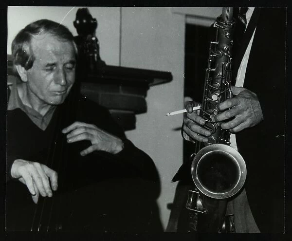 Phil Bates and the tenor saxophone of Spike Robinson at The Bell, Codicote, Hertfordshire, 1986