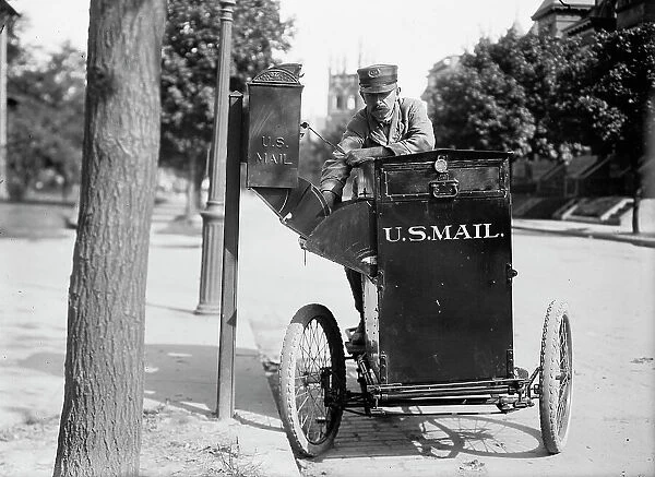 Post office Department - Motor Cycle Postman, 1912. Creator: Harris & Ewing. Post office Department - Motor Cycle Postman, 1912. Creator: Harris & Ewing