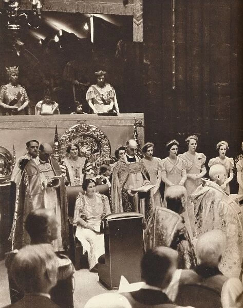 Queen Elizabeth looks on as her husband is crowned on the day of his coronation, 1937