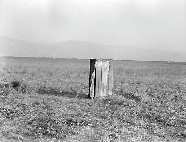 Sanitary facilities for migratory workers, Ditch bank camp, near Arvin, Kern County, CA, 1936. Creator: Dorothea Lange