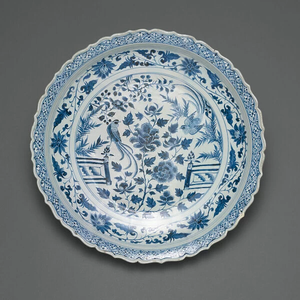 Shallow Dish with Long-Tailed Birds in a Garden of Stylized... Yuan dynasty, early / mid-14th cent. Creator: Unknown