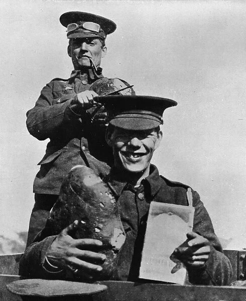 The Soldier and his Rations: A photograph taken at one of the British camps in France, 1914