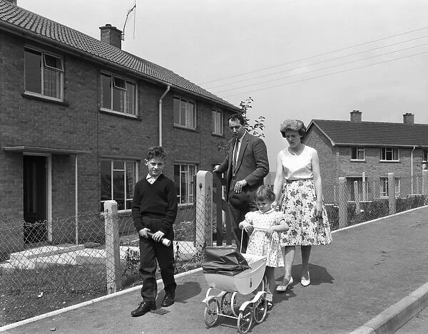Street scene with family, Ollerton, North Nottinghamshire, 11th July 1962. Artist