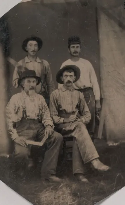 Framed Print : Four Workmen Holding Different Tools Print