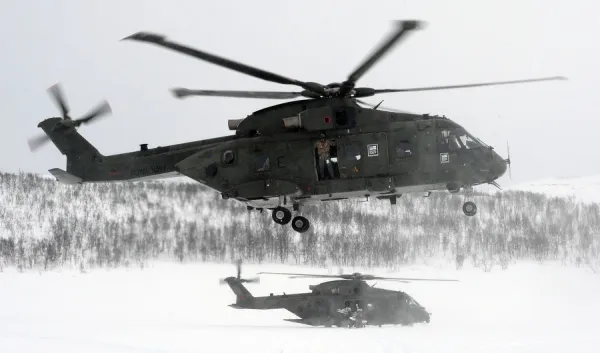 Two Commando Helicopter Force Merlin Mk3 helicopters on exercise in northern Norway