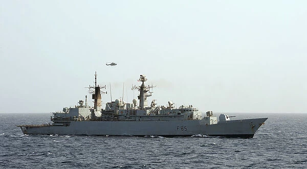 HMS Cumberland Is Photographed After Passing HMS Cornwall During Anti-Piracy Operations