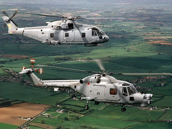 A Royal Navy Merlin (top) and Lynx Mk 8 helicopter