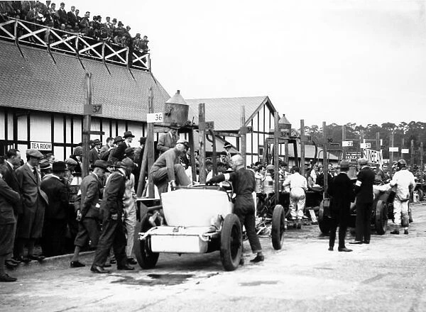 1929 BRDC 500 Miles. Brooklands, Surrey. 12th October 1929. Driver changes in the pit lane