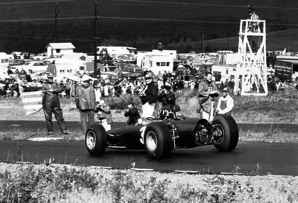 1965 United States Grand Prix. Watkins Glen, New York, USA. 1st-3rd October 1965. Graham Hill, BRM P261, 1st position, action. World Copyright - LAT Photographic. Ref- B / W Print