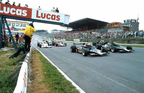 1978 British Grand Prix. Brands Hatch, England. 14-16 July 1978. Mario Andretti and Ronnie Peterson (both Lotus 79 Ford's) lead the field away at the start. Ref-78 GB 12. World Copyright - LAT Photographic