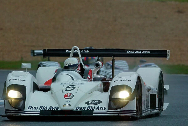 2003 FIA Sportscar Championship Estoril, Portugal. 12th - 13th April 2003 In the difficult conditions, John Nielsen took the lead. World Copyright: John Brooks / LAT Photographic ref: Digital Image Only