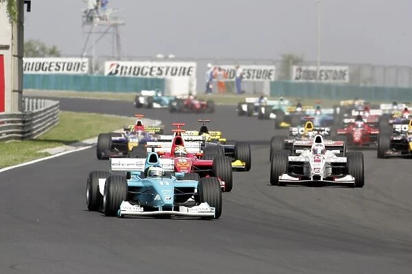 2005 GP2 Series - Hungary: Olivier Pla leads Ernesto Viso and Alexandre Premat, at the start of the race