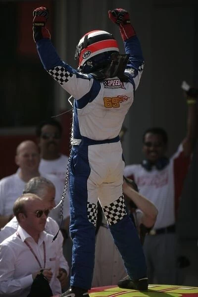 2008 Speedcar Series. Saturday Race. Dubai. Dubai Autodrome. 12th April. 2008 Speedcar champion Johnny Herbert celebrates victory. World Copyright: Alastair Staley  /  LAT Photographic Service ref: __P9O4731. jpg
