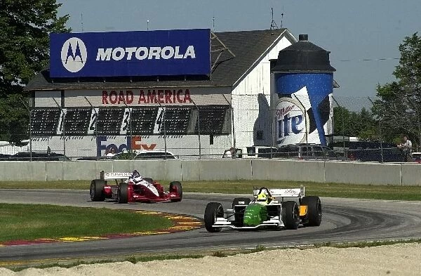 Christian Fittipaldi leads Scott Dixon through turn 14 at the Motorola 220 at Road America