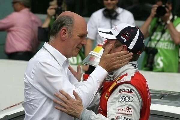 DTM. L-R: Dr. Wolfgang Ullrich, Head of Audi Sport congratulates race winner