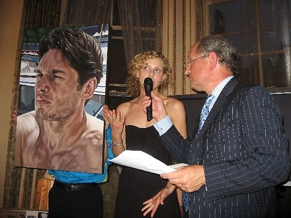 The F1 Party: Jill Bradley, artist, with her portrait of Giancarlo Fisichella that sold for £25, 000 after a bidding war between Bernie Ecclestone