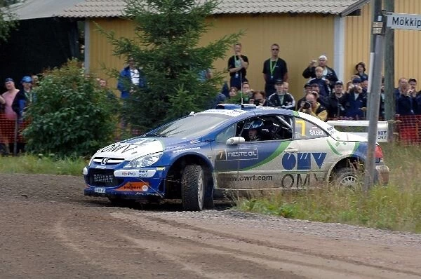 FIA World Rally Championship: Manfred Stohl, Peugeot 307 WRC, with damaged front left suspension on Stage 6