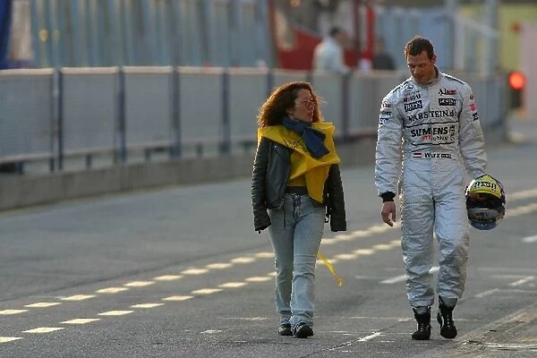 Formula One Testing: Journalist, Niki Takeda chats with Alex Wurz McLaren Mercedes MP4-17D at the end of the days running