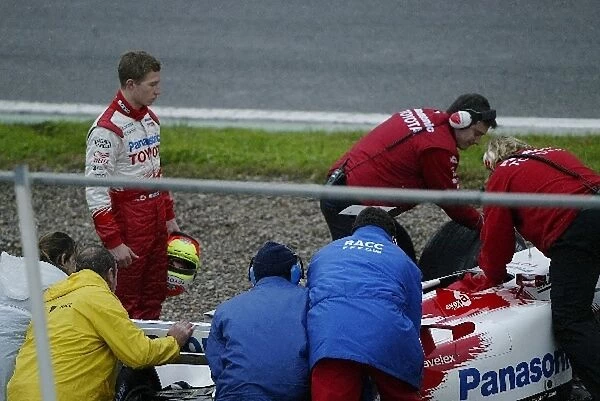 Formula One Testing: Ryan Briscoe puts the Toyota into the Gravel trap
