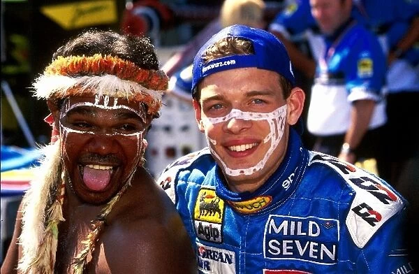 Formula One World Championship: Alexander Wurz Benetton Playlife B199 and local Aborigine