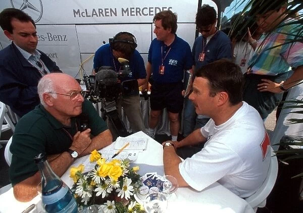 Formula One World Championship: BBC TV Commentator Murray Walker talks with Nigel Mansell who finished tenth in his first race with McLaren